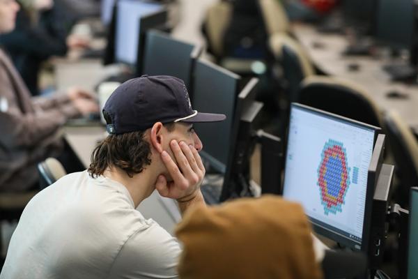 Student looking at a computer screen