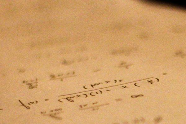 Math equations written on paper